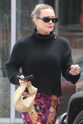 Hilary Duff in a Floral Print Skirt and Black Turtleneck Sweater - Beverly Hills 04/16/2023