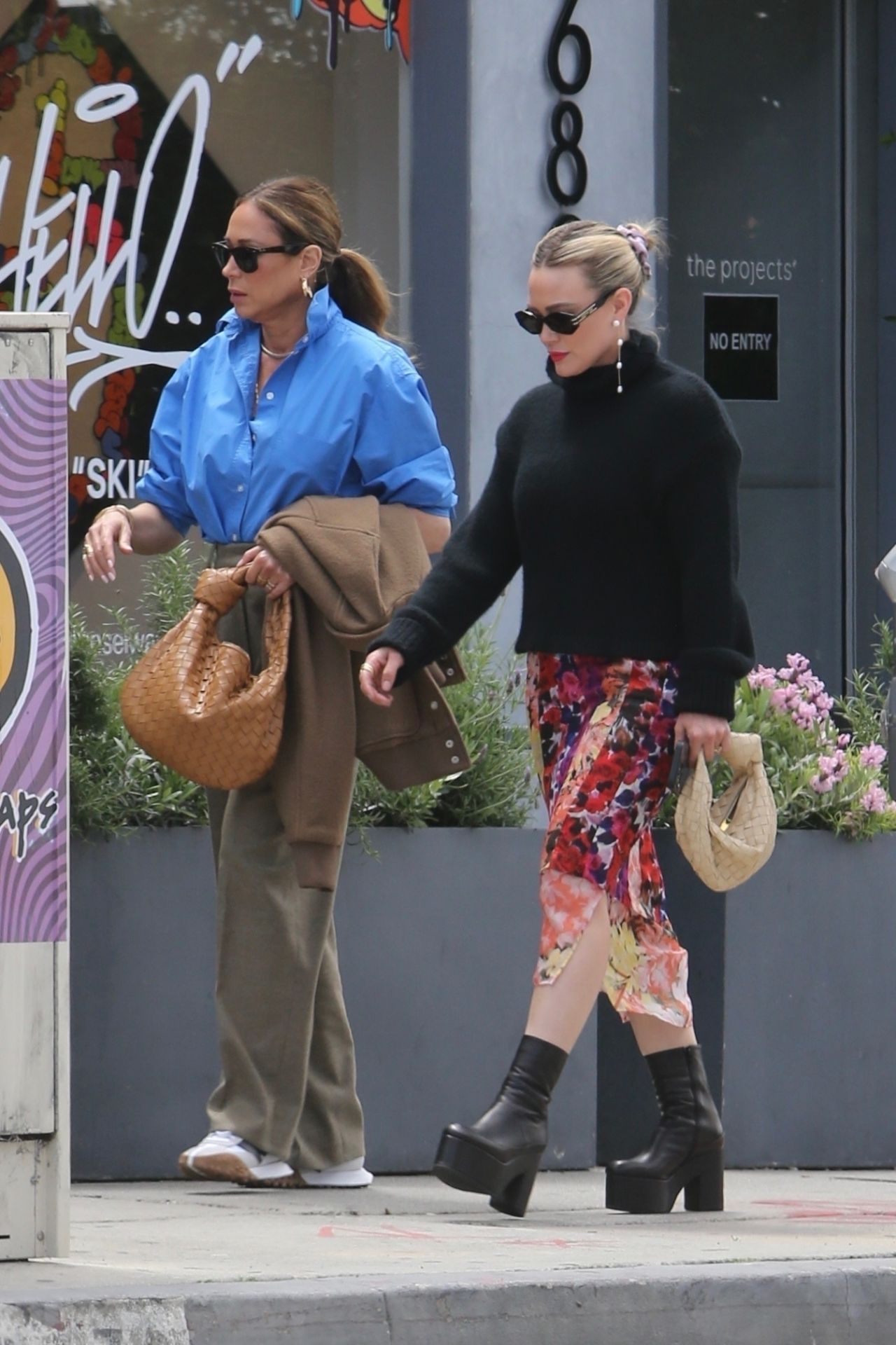 Hilary Duff in a Floral Print Skirt and Black Turtleneck Sweater ...