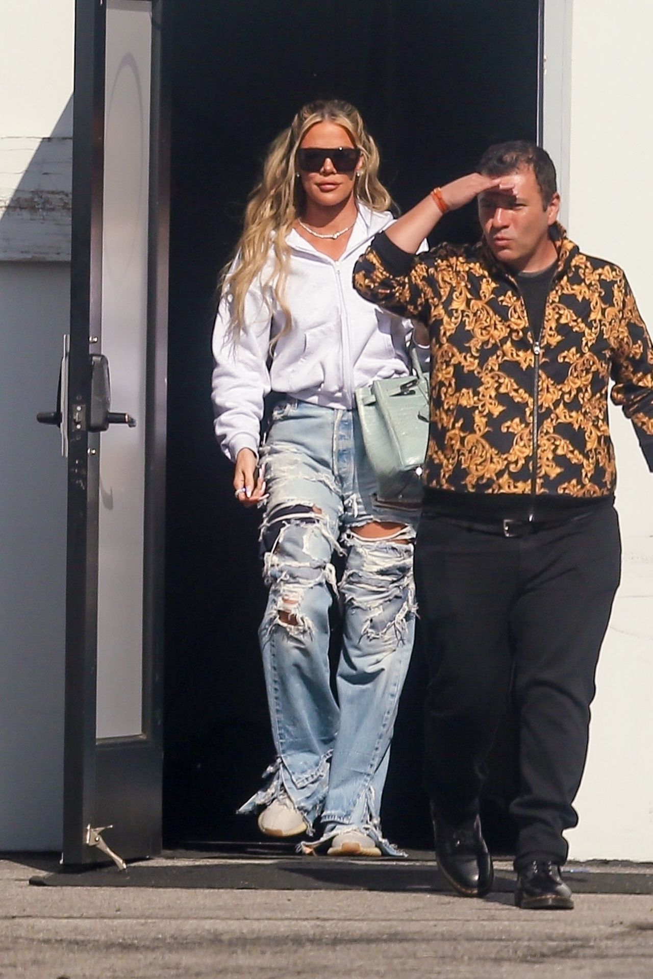 Khloe Kardashian In Ripped Jeans In Calabasas 04/12/2023 • CelebMafia