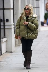 Mollie King in a Green Jacket and Boots - London 04/01/2023