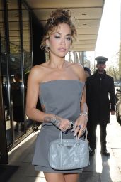Rita Ora Wearing a Grey Prada Dress and Carrying a Light Blue Prada Handbag in London 04/18/2023