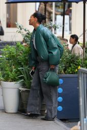 Tracee Ellis Ross in a Green Puffer Jacket With a Matching Handbag and Baggy Denim in New York 04/24/2023