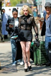 Zoe Lister-Jones in Black Mini Skirt and Platform High Heels in New York 04/22/2023
