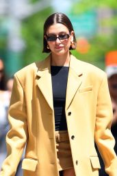 Hailey Rhode Bieber in a Yellow Trench Coat in New York 05/10/2023