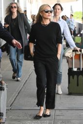 Kate Moss in Black Attire at JFK Airport in NY 05/23/2023