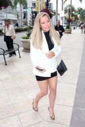 Kendra Wilkinson in a Short Black Mini Skirt and a Jacket - Shopping at Versace in Beverly Hills 05/24/2023