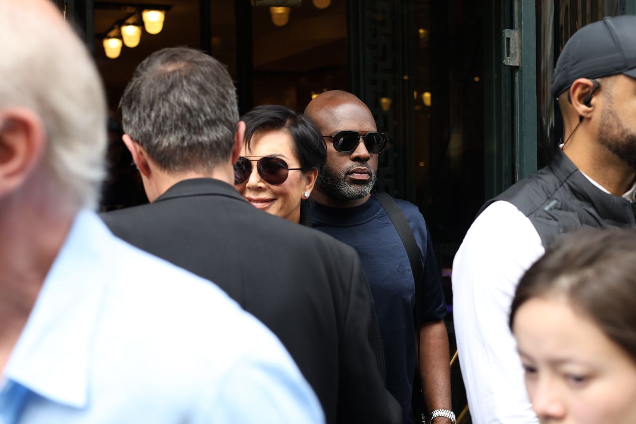 Corey Gamble carries a Hermes shopping bag on Rodeo Drive