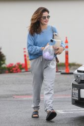 Lucy Hale in a Blue Sweater and Gray Sweatpants - Hollywood 05/24/2023