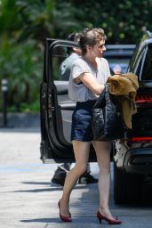 Milla Jovovich Shows of New Hairstyle - Four Seasons in Los Angeles 05/08/2023