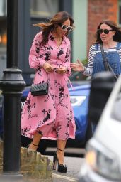 Myleene Klass in a Pink Floral Tropical Shirt Dress and White Shades - London 05/04/2023