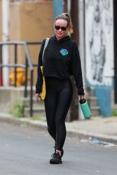 Olivia Wilde in a Black Hoodie, Leggings and Adidas Sneakers at Tracy Anderson Gym on Los Angeles 05/09/2023