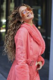 Rita Ora Wearing Coral-coloured Leather Ensemble in Sydney 05/29/2023