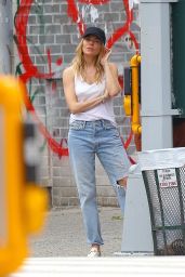 Sienna Miller in Jeans and a White Tank Top in New York 05/16/2023