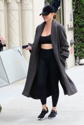 Chrissy Teigen in Leggings and Trench - Shopping on Father