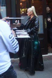Christina Aguilera in a Large Vinyl Coat in Tribeca 06/25/2023