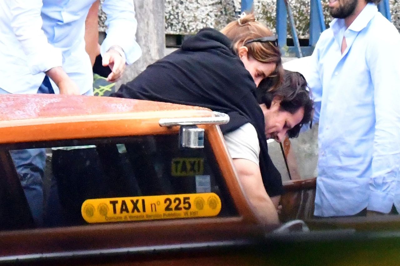 Emma Watson enjoys piggyback ride on Ryan Kohn while out in Venice Lido,  Italy