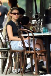 Gigi Hadid in a Black Top and Denim Shorts in New York 06/25/2023
