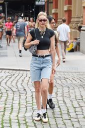 Gigi Hadid in a Black Top and Denim Shorts in New York 06/25/2023