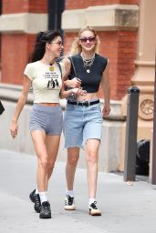 Gigi Hadid in a Black Top and Denim Shorts in New York 06/25/2023