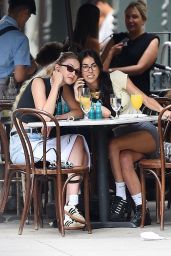 Gigi Hadid in a Black Top and Denim Shorts in New York 06/25/2023