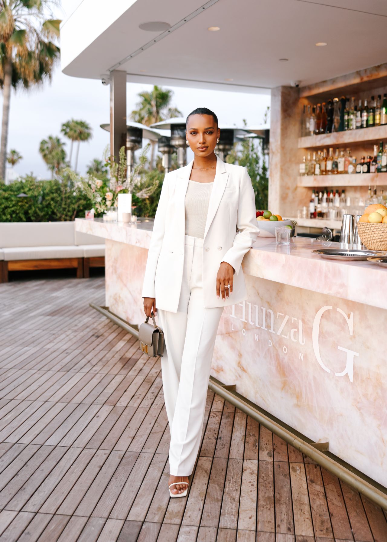 Jasmine Tookes - Celebrates Rose Inc x Hunza G Collaboration in Los