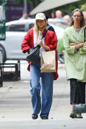 Jennifer Lawrence in a Blue Jeans and a Polo White and Red Hat in NYC 06/22/2023