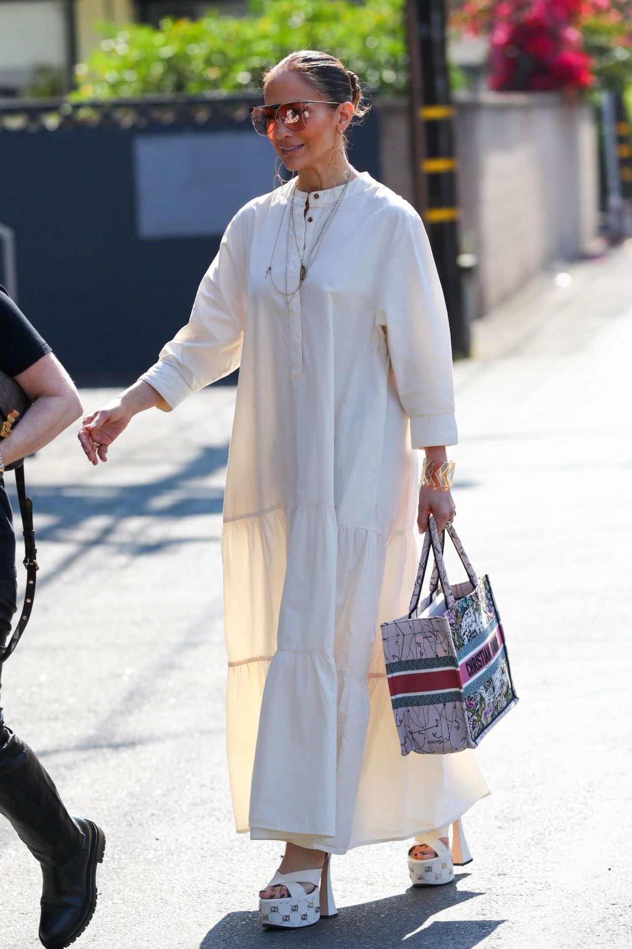 Jennifer Lopez in Gucci Heels Paired With a Christian Dior Purse