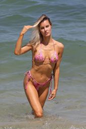 Joy Corrigan in a Pink Flowered Bikini on the Miami Beach 06/10/2023