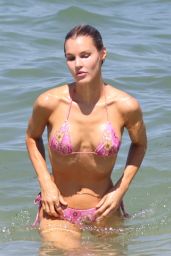 Joy Corrigan in a Pink Flowered Bikini on the Miami Beach 06/10/2023