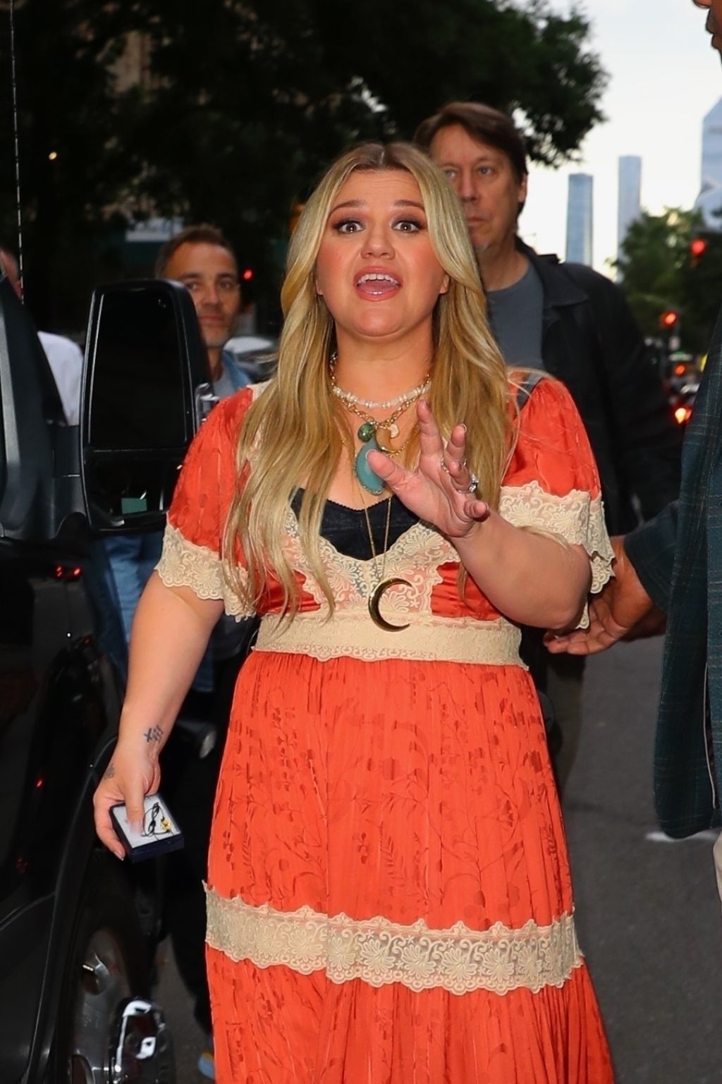 Kelly Clarkson in a Orange and White Long Dress in New York 06/21/2023