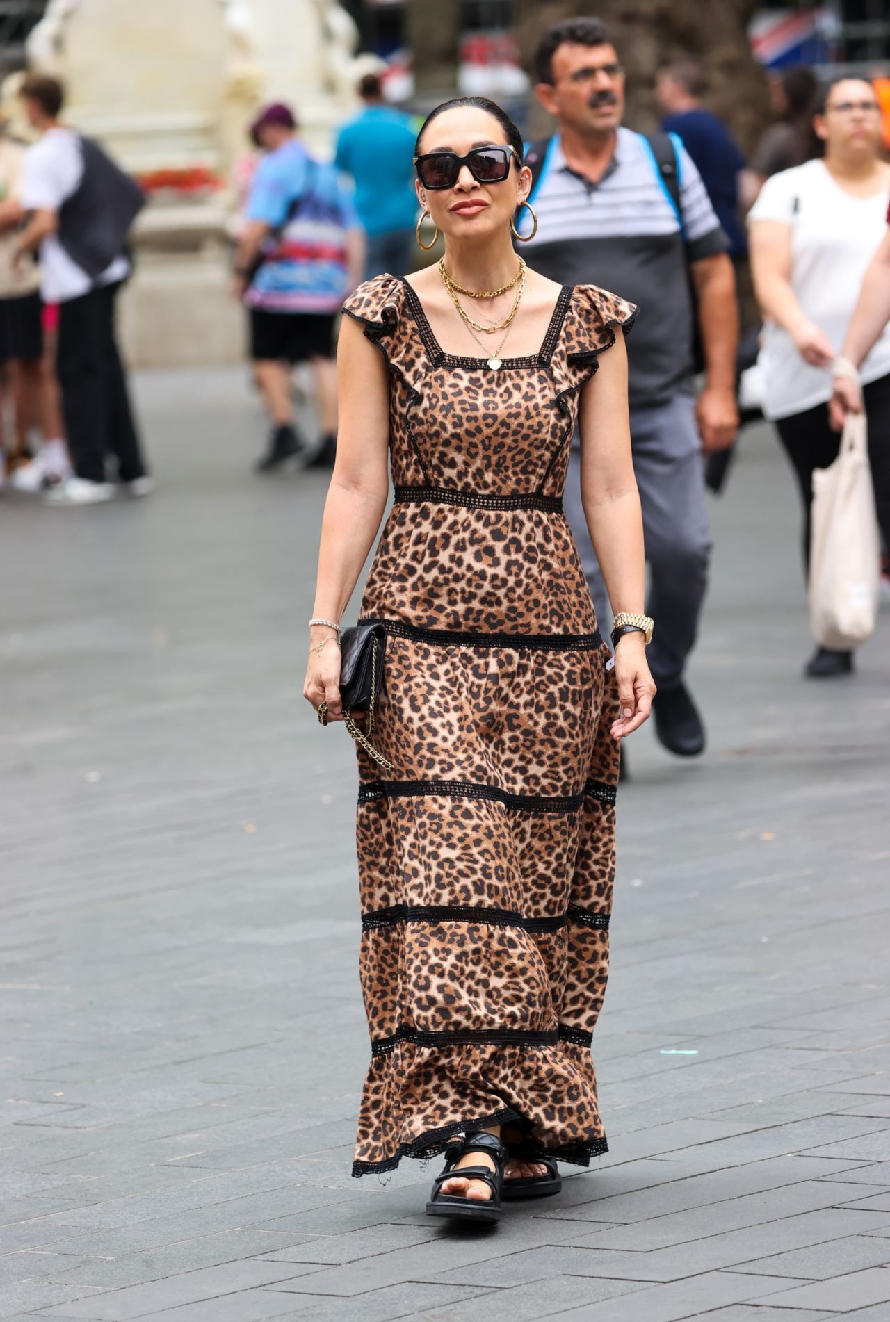 Myleene Klass in an Animal Print Dress Pictured at Smooth Radio in