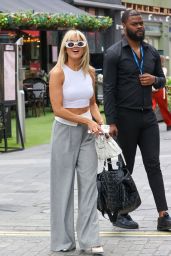 Ashley Roberts Wearing a White Crop Top and Retro Glasses - London 07/12/2023