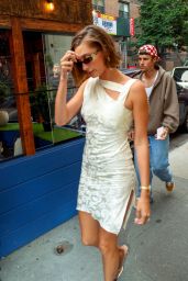 Hailey Rhode Bieber in a Fashionable White Dress at L