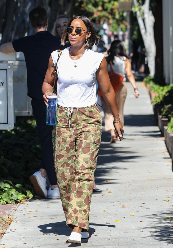 Kelly Rowland in Camouflaged Colored Pants, White Top and White Sandals Shopping on Melrose in LA 07/20/2023
