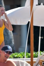 Kimberley Garner in an Orange Swimsuit at the Cheval Blanc Hotel in Saint-Tropez 07/29/2023
