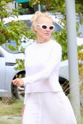 Pamela Anderson in a White Sweater Paired With a White Skirt and Matching White Frame Sunglasses - Malibu 07/09/2023