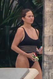 Chrissy Teigen in a Black Swimsuit in Puerto Vallarta 08/08/2023