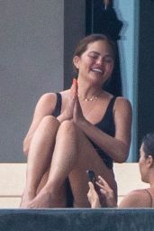 Chrissy Teigen in a Black Swimsuit in Puerto Vallarta 08/08/2023