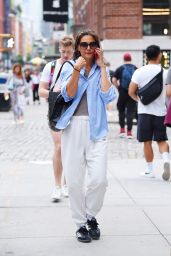 Katie Holmes in Comfy Alo Sweatpants Chats on Her Phone in New York 08/09/2023