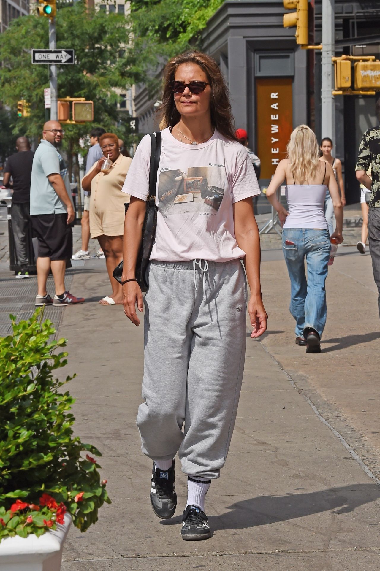 Katie Holmes in Gray Sweatpants and a White T-shirt in New York 08/05/2023  • CelebMafia