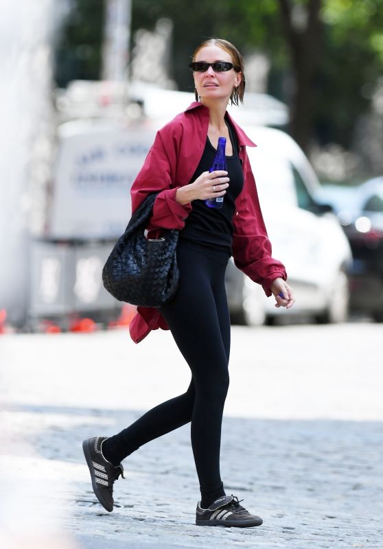 Lara Worthington Wearing a Stylish Red Coat - NYC 08/22/2023