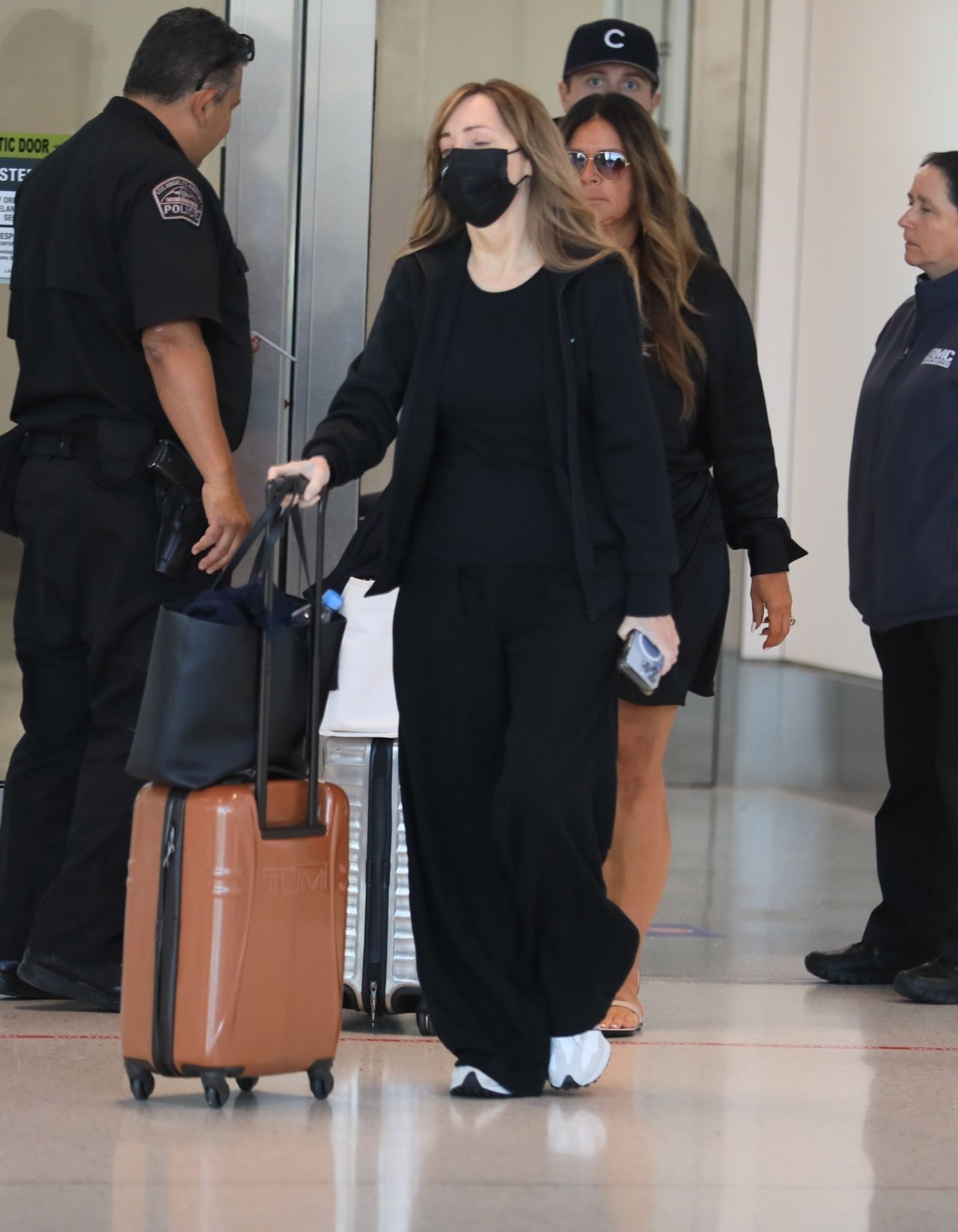 Robin Greenhill and Lou Taylor Arriving Into Los Angeles 08/29/2023