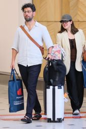 Sarah Abo and Husband Cyrus Moran at Sydney Airport 08/27/2023