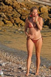 Sienna Miller in a Bikini on the Beach in Ibiza 08/20/2023