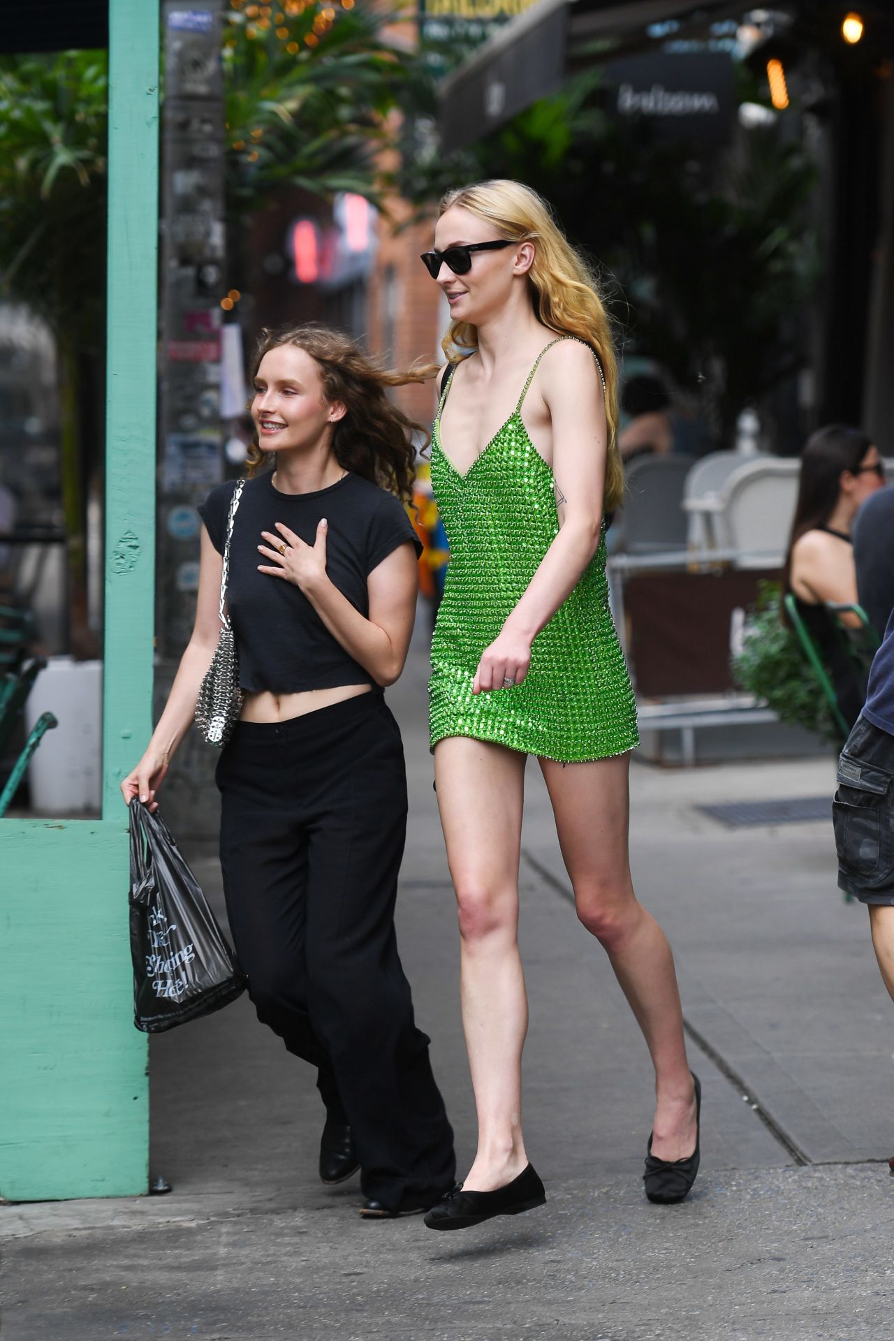 Sophie Turner in a Green Cocktail Dress in New York 08/12/2023 • CelebMafia