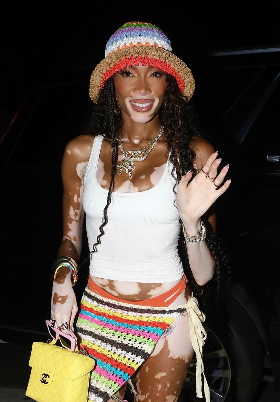 Winnie Harlow Wearing Colorful Bucket Hat and Matching Skirt at a Party at Giorgio Baldi in Santa Monica 08/15/2023