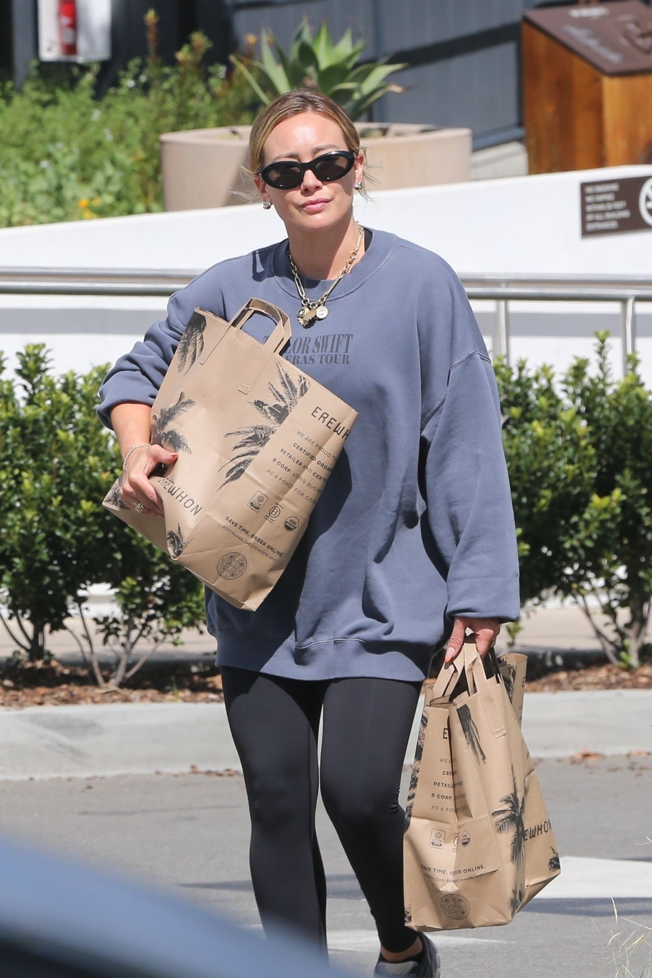 Alo yoga Muse Hoodie worn by Hilary Duff on Los Angeles February 7