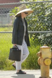 Kim Basinger in a Big Straw Hat and Sandals in LA 09/22/2023