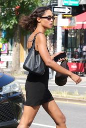 Laura Harrier in a Chic Black Mini Dress - Manhattan 09/07/2023