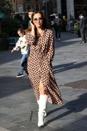 Myleene Klass in a Patterned High Split Dress and White Boots in London 09/14/2023